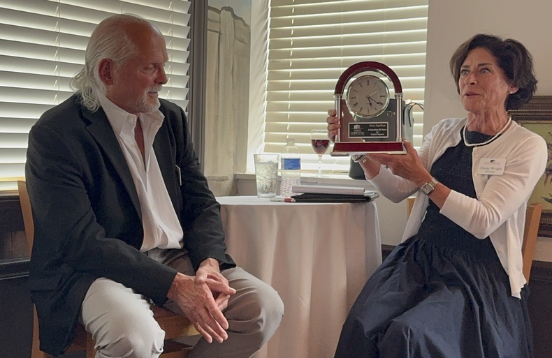 Vince Squillace and Chrisy Wright with clock